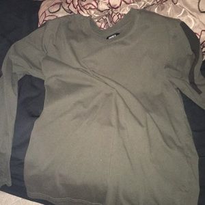 A Long Sleeve, Green With Stripes Along The Side